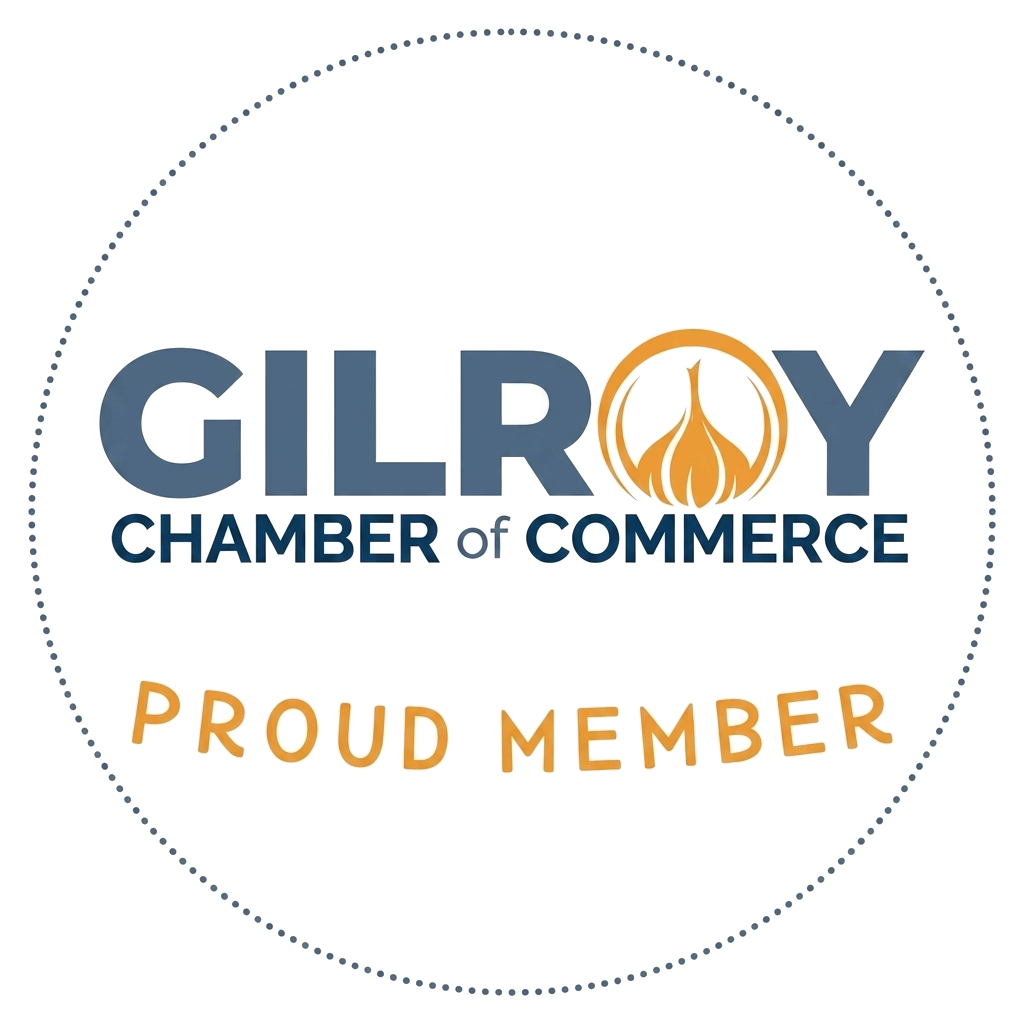 Gilroy Chamber of Commerce proud member logo in blue and gold inside a dotted circle