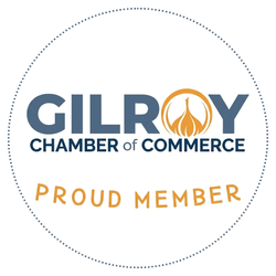 Gilroy Chamber of Commerce proud member badge with blue and gold text in a dotted circle