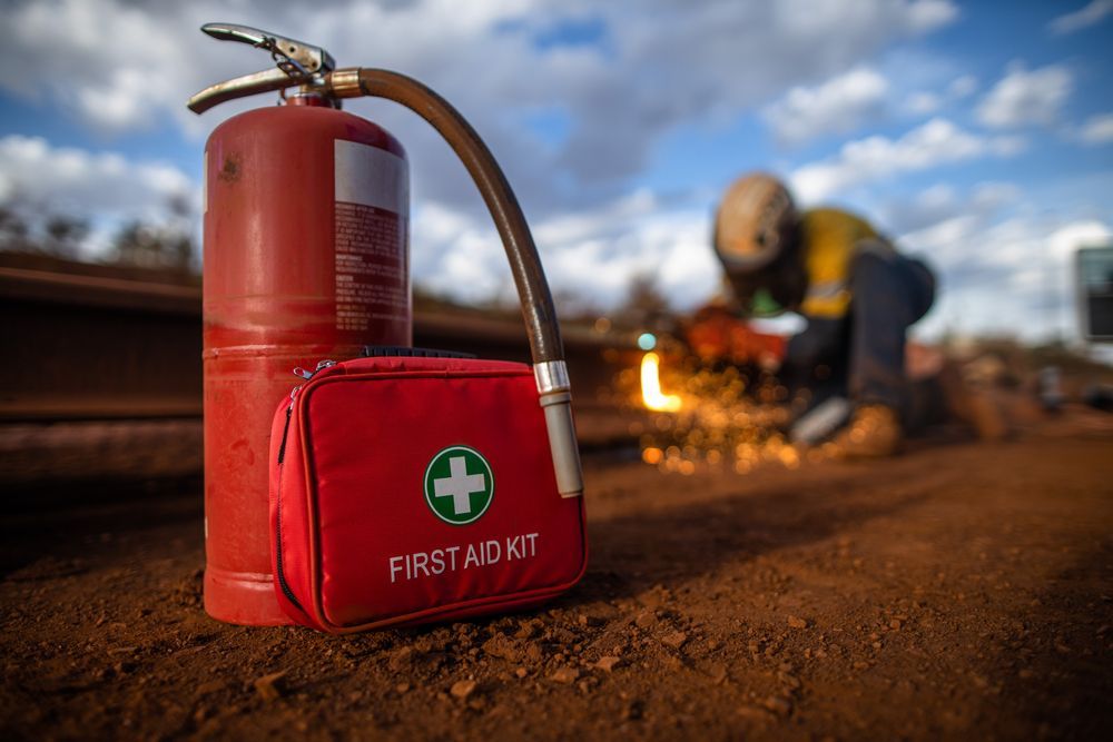 Fire Extinguisher and First Aid Kit on Construction Site — Industry Fire Services in Port Mackay, QLD