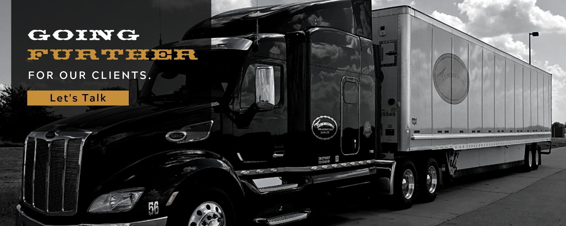 Black semi-truck and trailer with “Going Further for our clients” text and “Let’s Talk” button banner