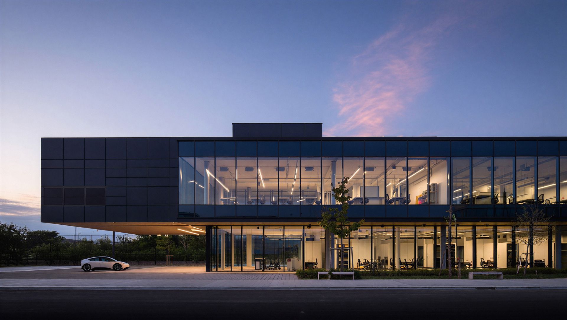 Modern office building with glowing glass Modern office building with glowing glass