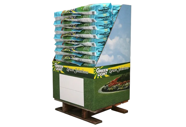 Stack of blue and green promotional bags on a wooden pallet display stand