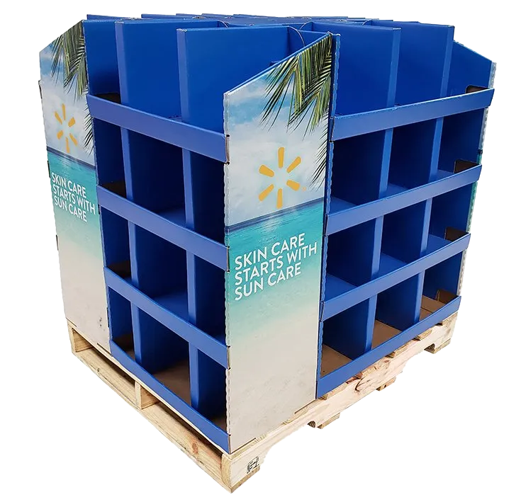 Blue retail display pallet with partitioned compartments and sunflower-branded side panels