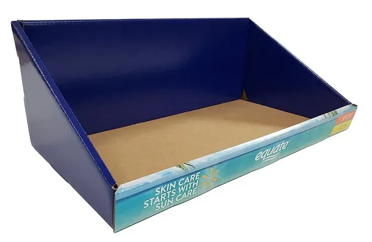 Blue cardboard display tray with a tan base and teal front edge on a white background