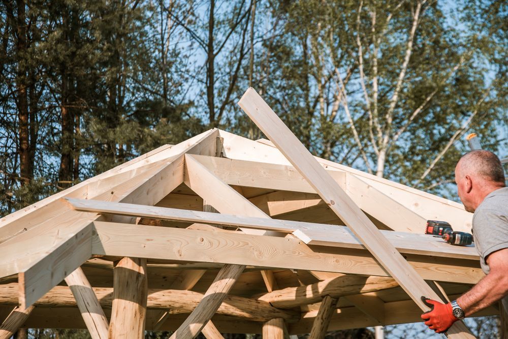 Roofer Building a House Roof