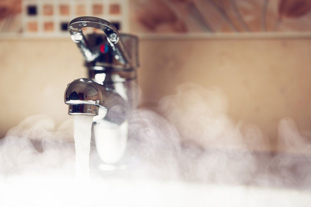 Running Water From Faucet In The Bathroom