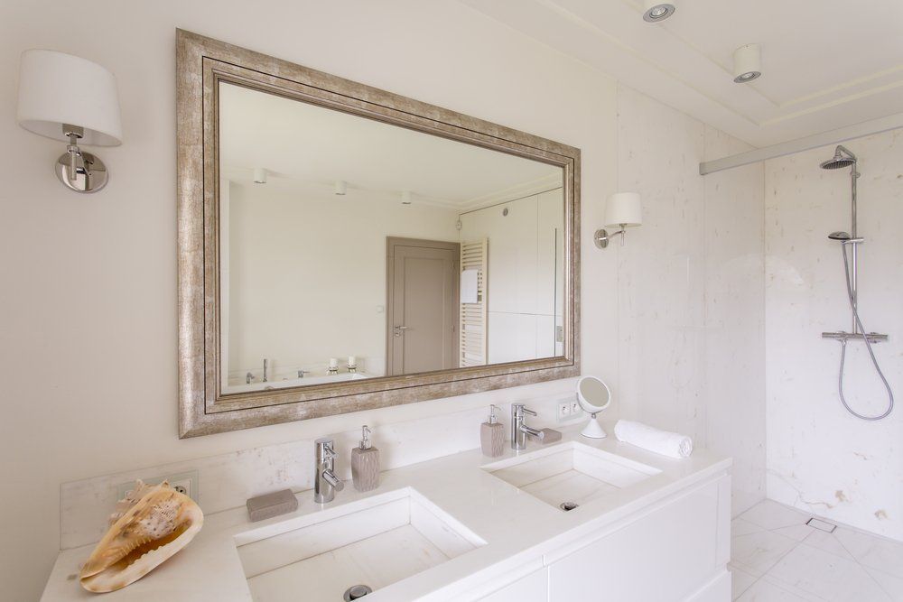A Bathroom With Two Sinks and a Large Mirror — Mid Richmond Plumbers & Suppliers in Byron Bay, NSW