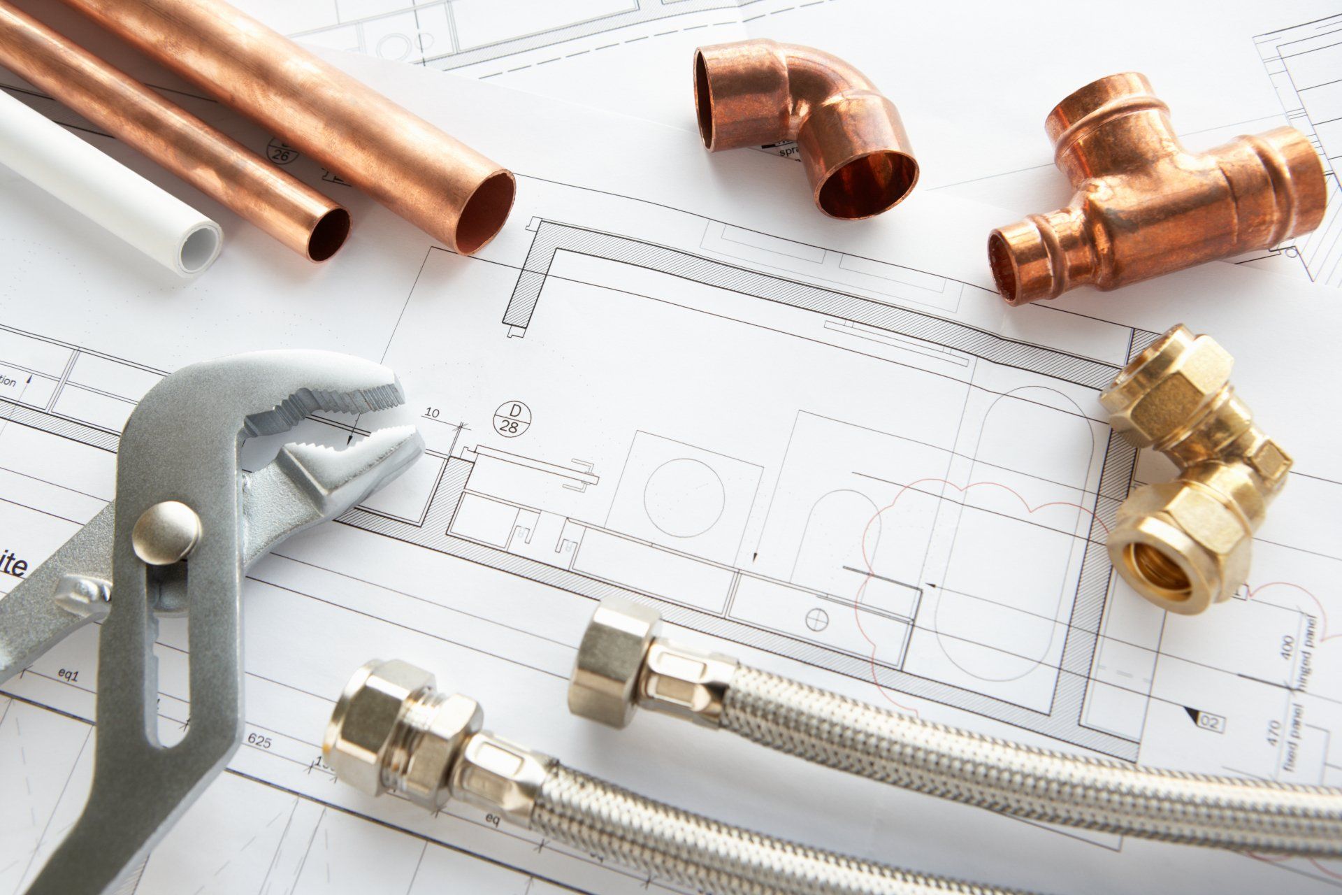 Plumbing Tools and Pipes on a Blueprint — Mid Richmond Plumbers & Suppliers in Coraki, NSW