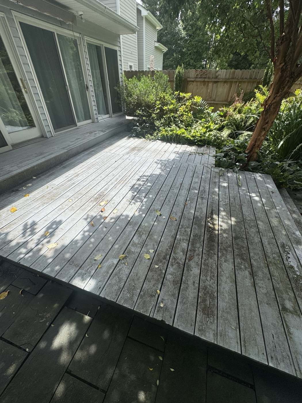 Weathered deck before pressure washing