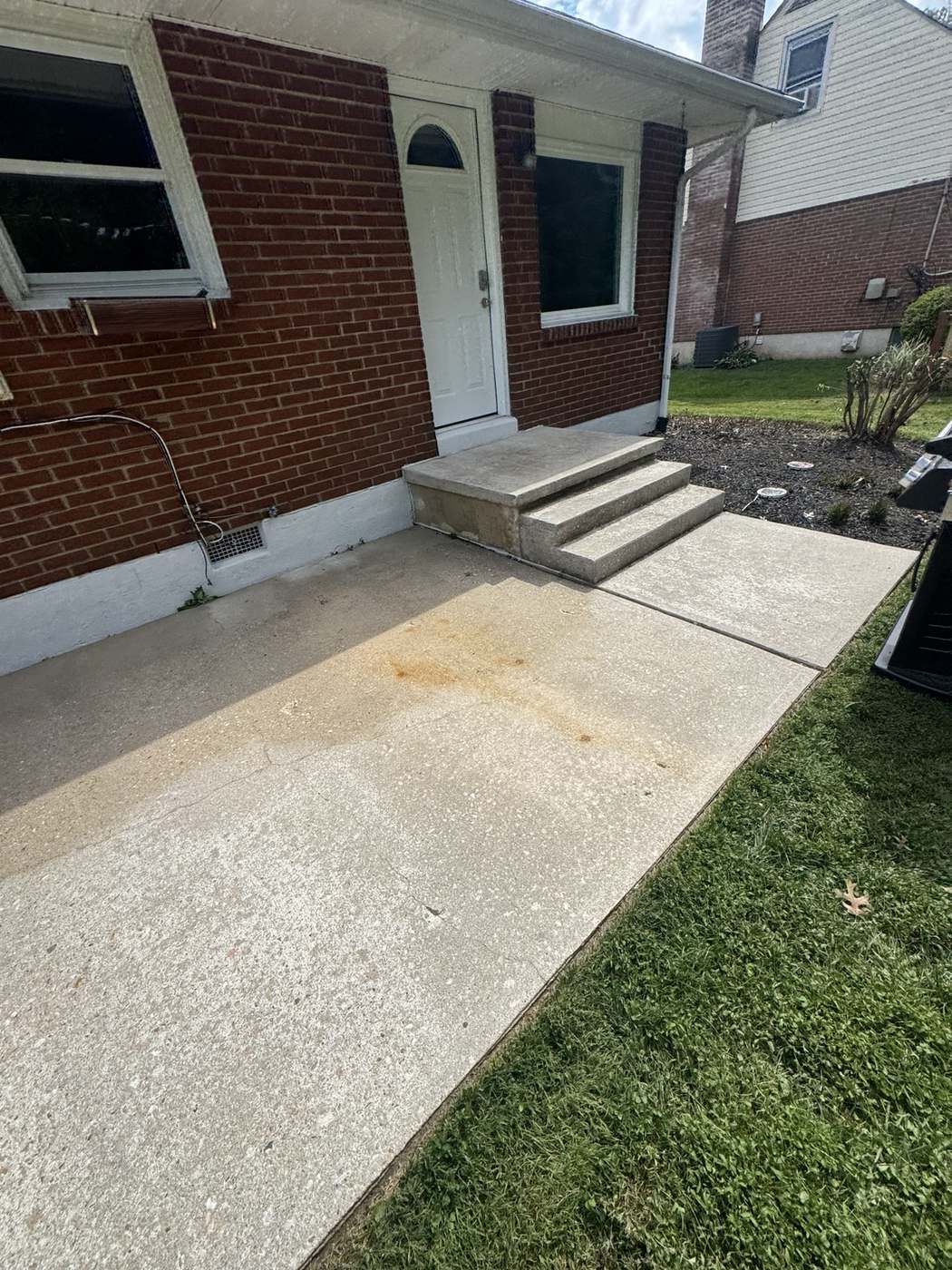 Side concrete patio after cleaning
