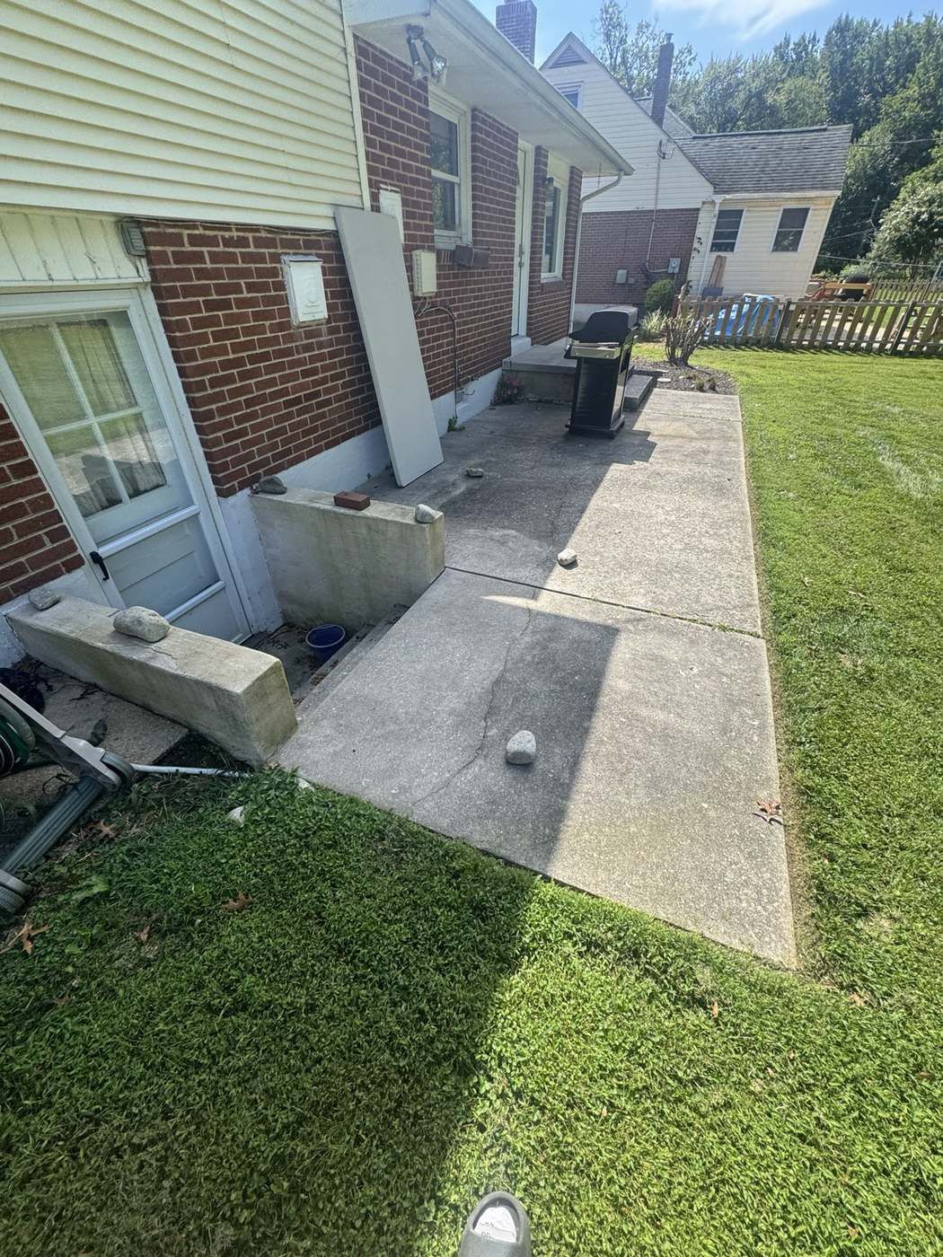 Side concrete patio before cleaning