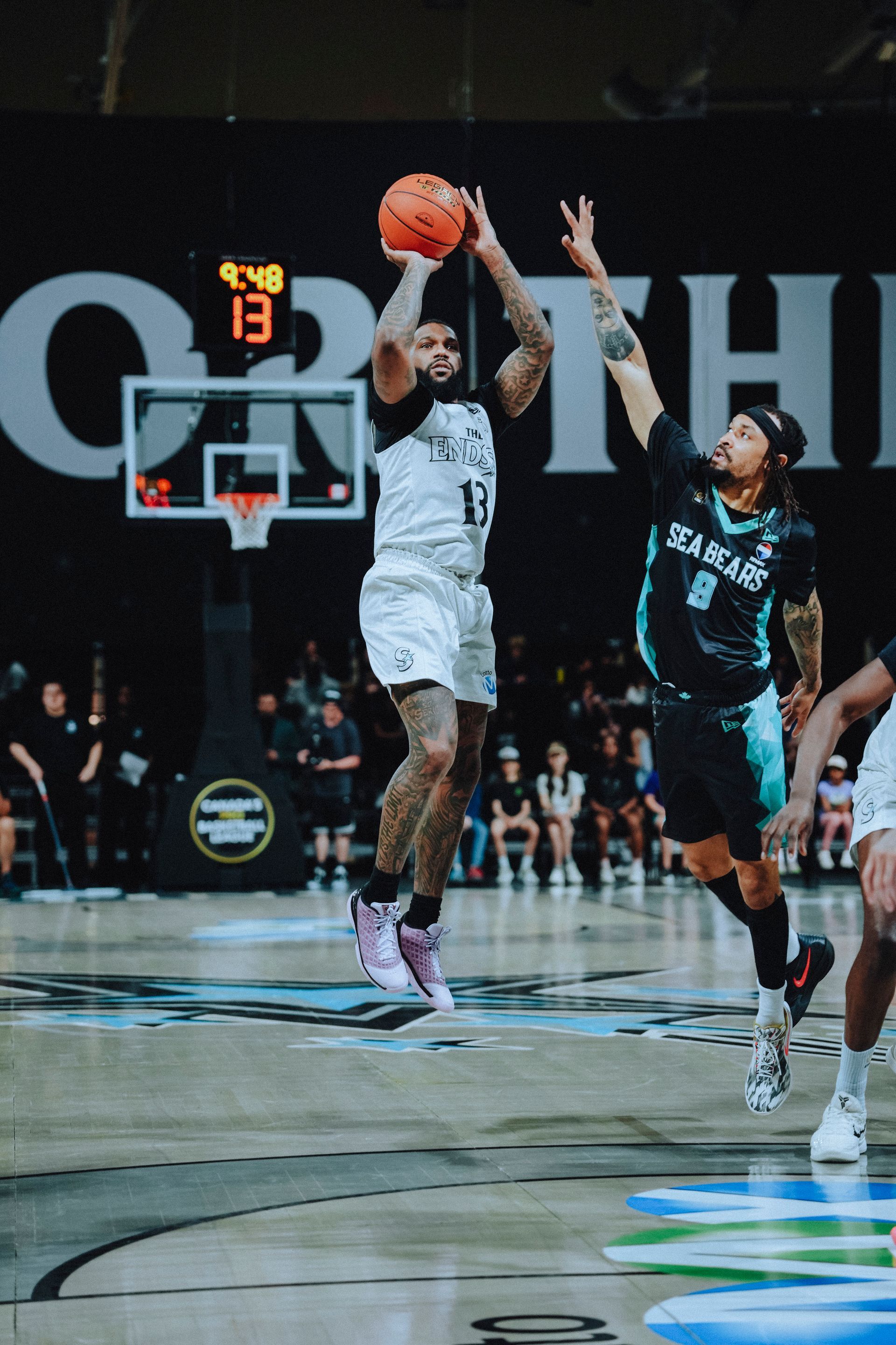 Myles Powell rises up for a shot over Trey McGowens
