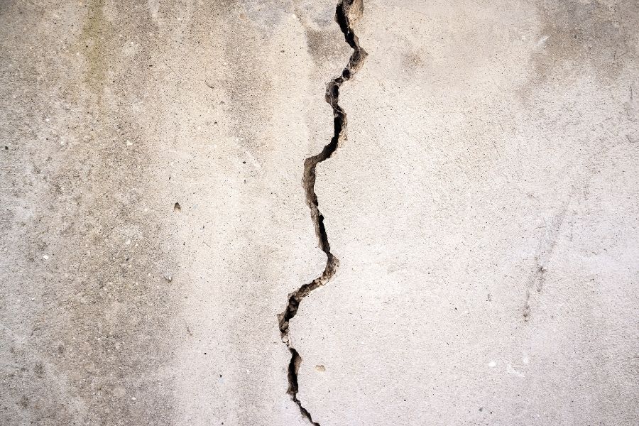 Foundation crack in basement wall allowing water intrusion