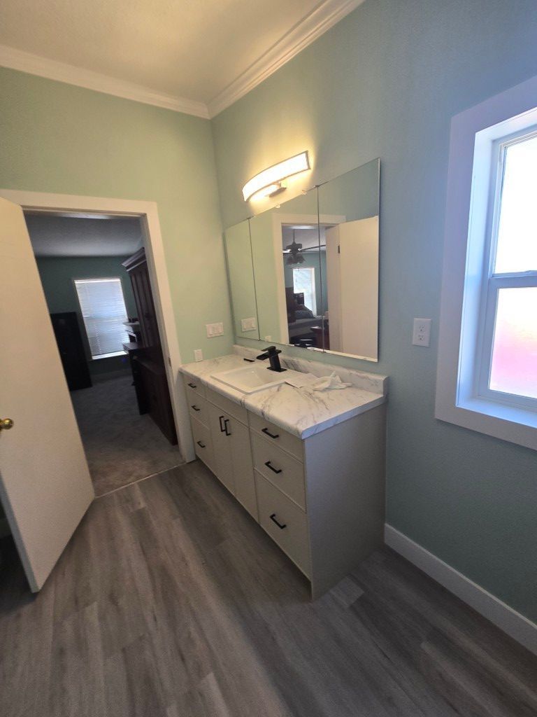 Finished bathroom remodel showing completed renovation from water damage repair