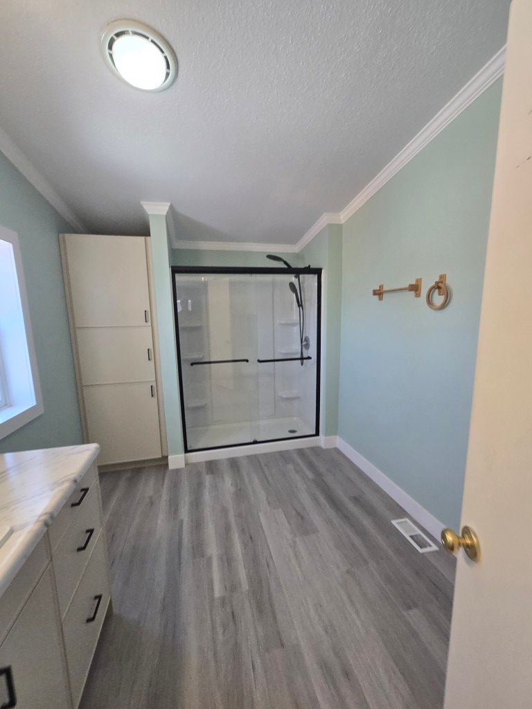 Updated bathroom vanity and fixtures after full reconstruction