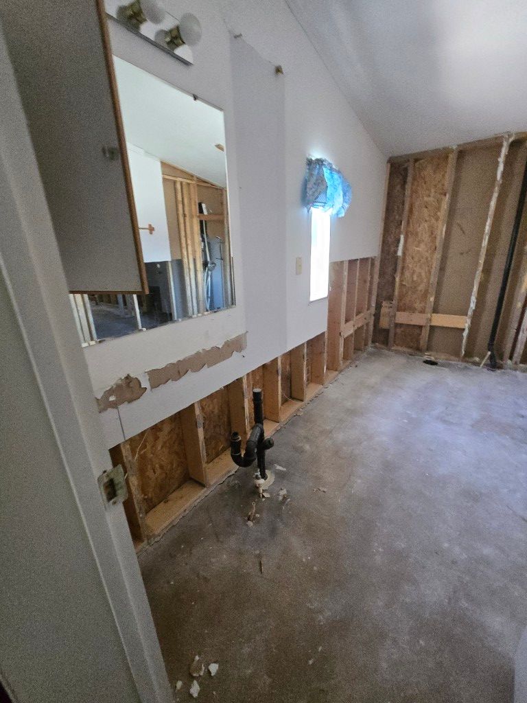 Water-damaged bathroom before restoration in Hyrum Utah