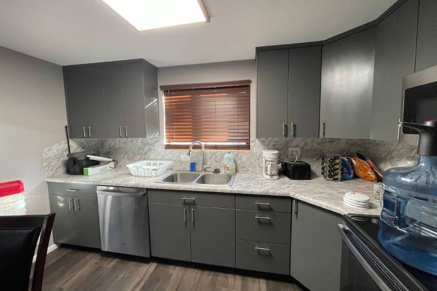 Completed kitchen reconstruction after fire damage by Swift Restoration and Remodeling