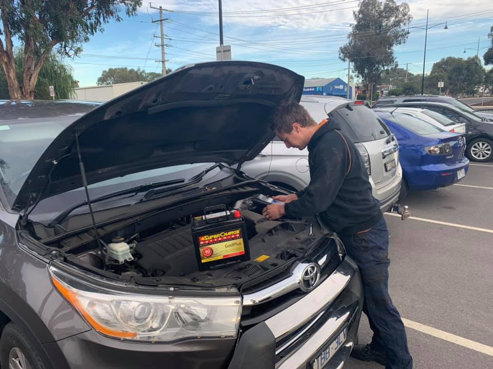 Mechanic Checking Car Battery — O'Neill's Autos in Wodonga, VIC