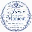 Blue circular logo reading “Savor the Moment Bed and Breakfast,” Bardstown, KY, with decorative flourishes.