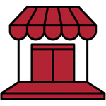 Red shop front with awning and doors.