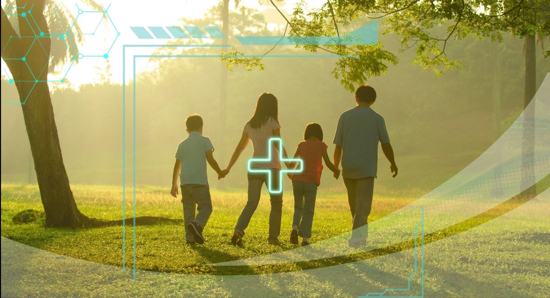 A family is walking in a park holding hands.