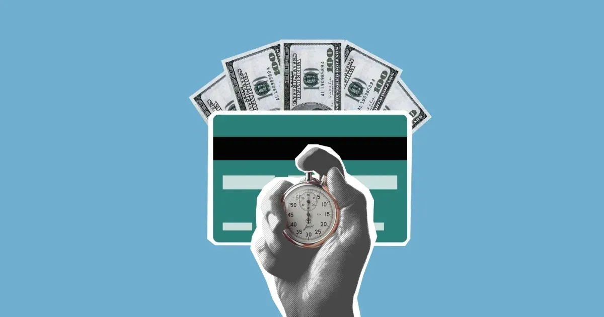Hand holding pocket watch in front of credit card and cash against a light blue background. Hand holding pocket watch in front of credit card and cash against a light blue background.