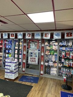 A store with a sign that says beer cave