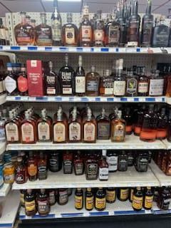 Four Bottles of Liquor Are Lined up