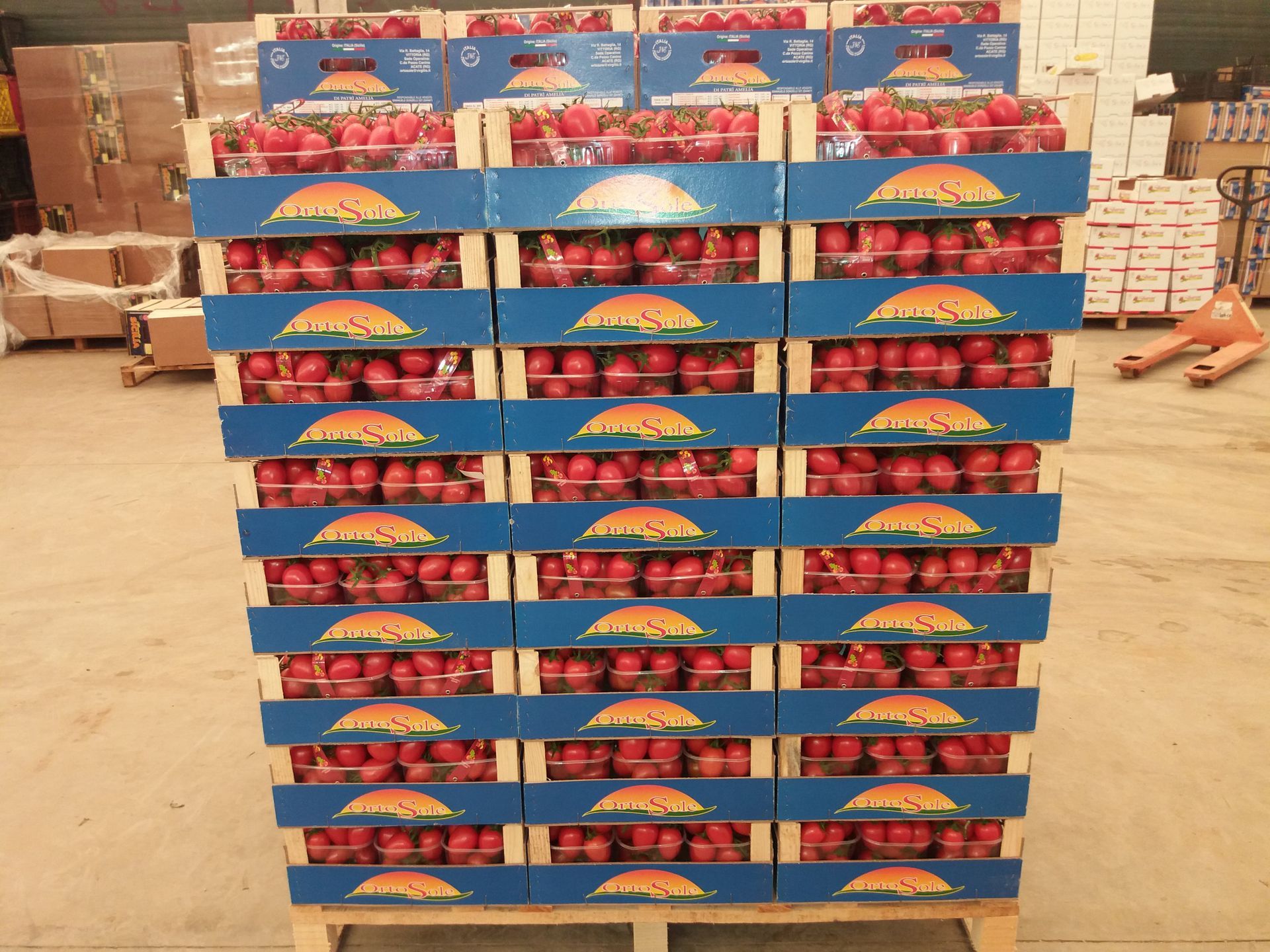 crates of cherry tomatoes
