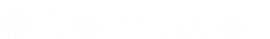 Faint, blurry image of what appears to be writing or a logo in white on a white background.