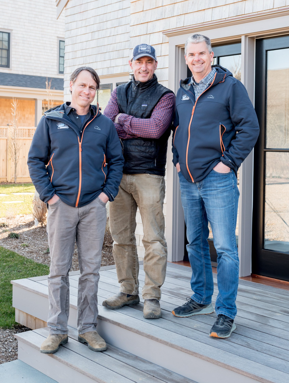 Rhett Dupont, Joe Gamberoni and Rich Gammons standing on a deck