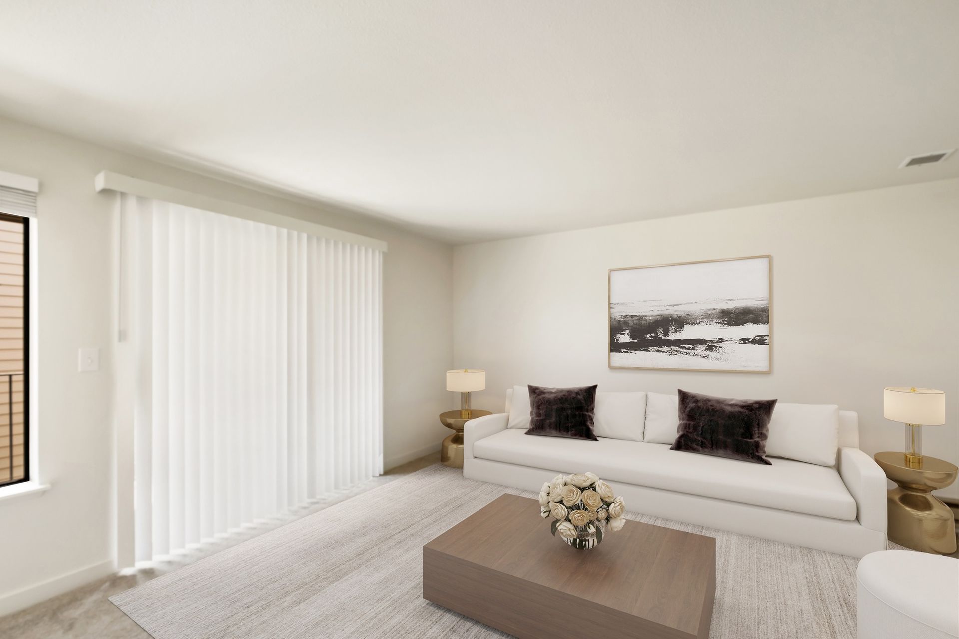 Bright living room with white sofa, beige ottoman, floor lamp, and sliding vertical blinds.