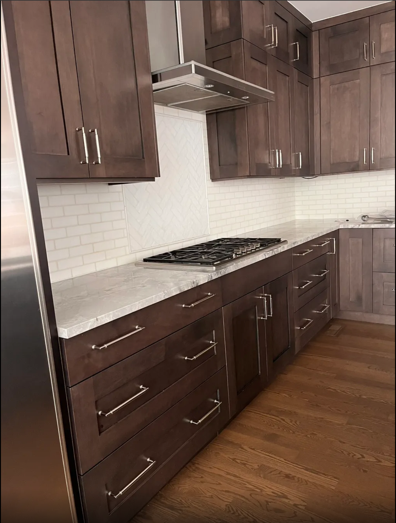 Brown custom cabinets in a kitchen