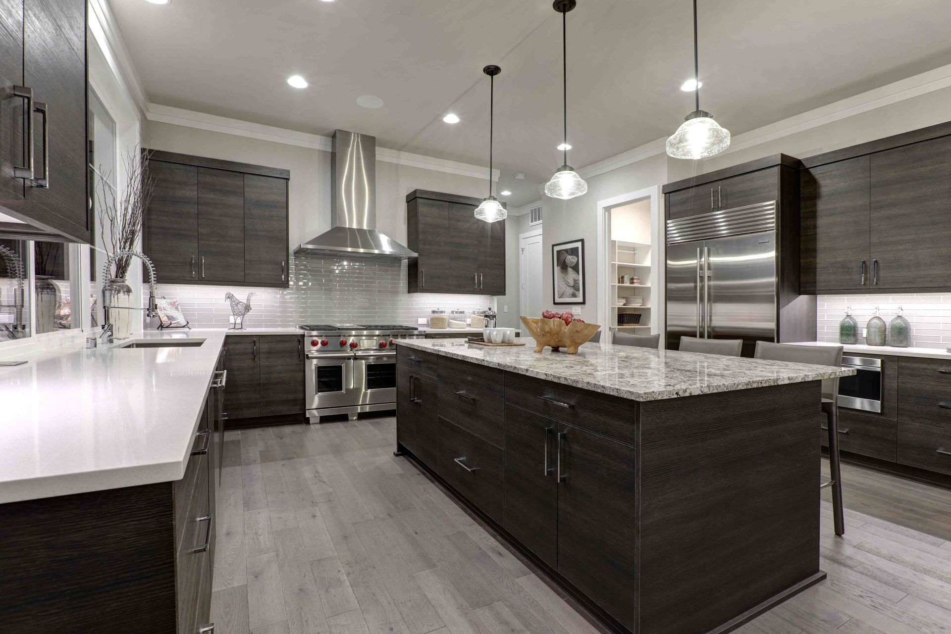 the finished product of a kitchen island designed by our cabinet maker and interior designer