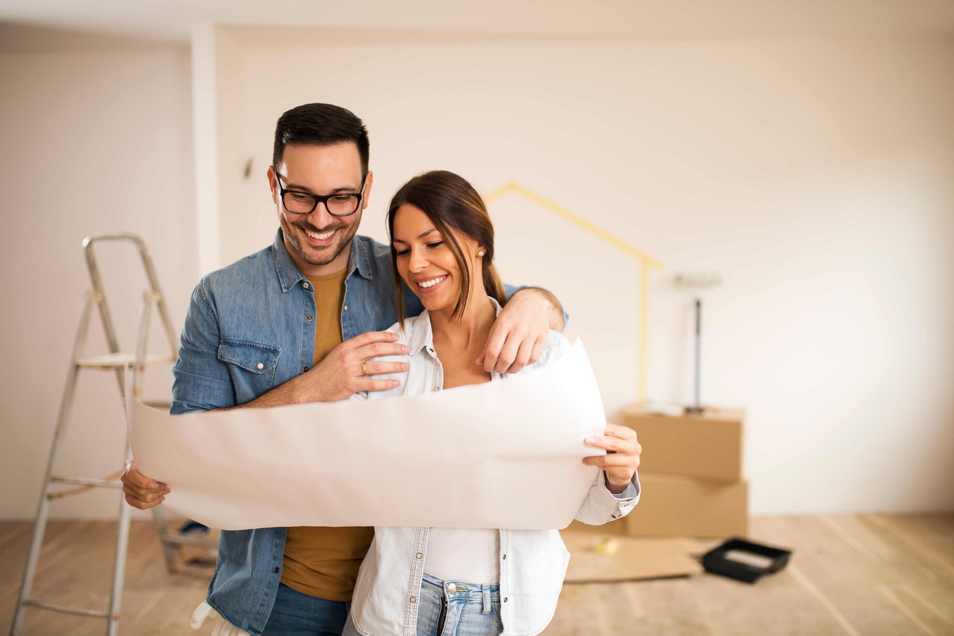 A happy couple thinking about their remodeled kitchen