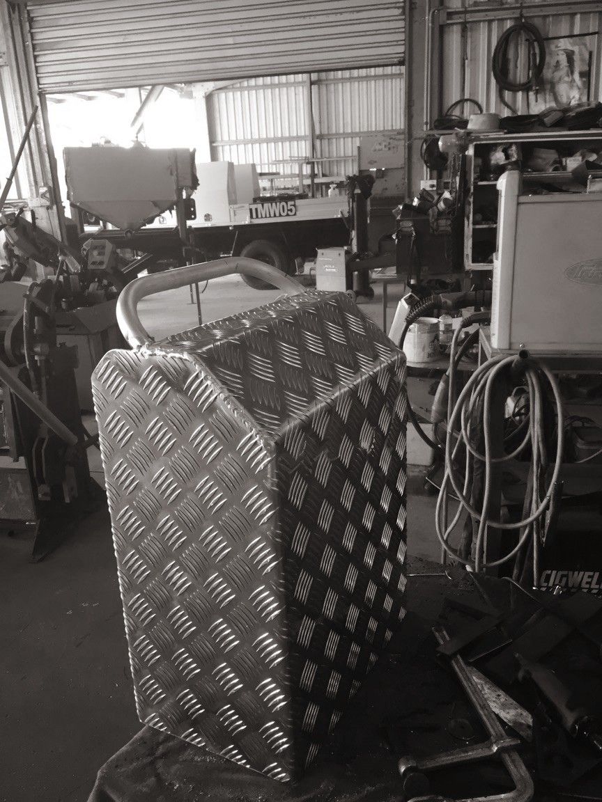 A Black And White Photo Of A Metal Box In A Garage — Tinman's Welding Worx In Mackay, QLD