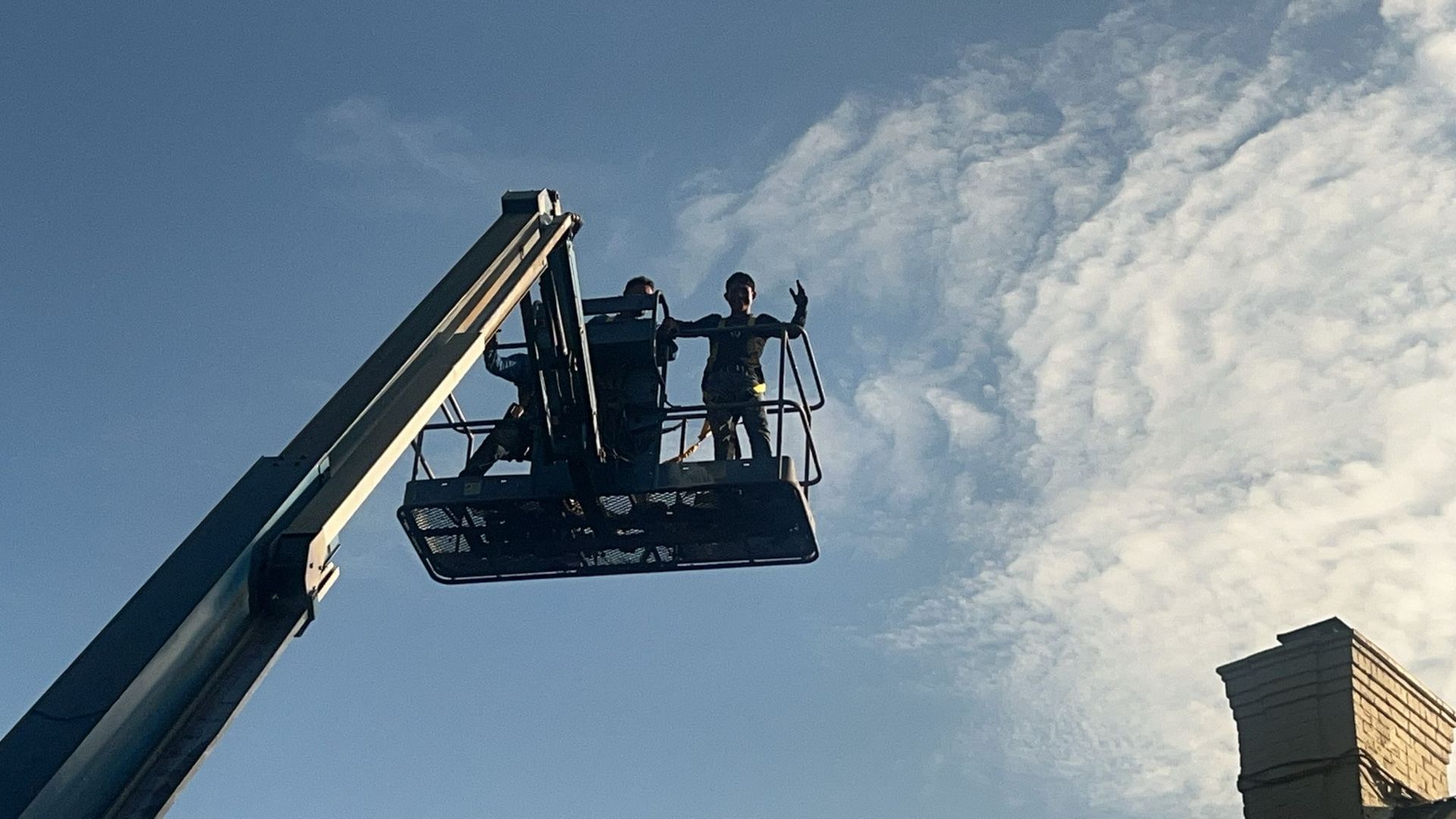 metal roofing project using crane