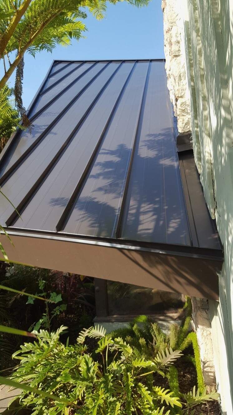 metal roofing project view from backyard