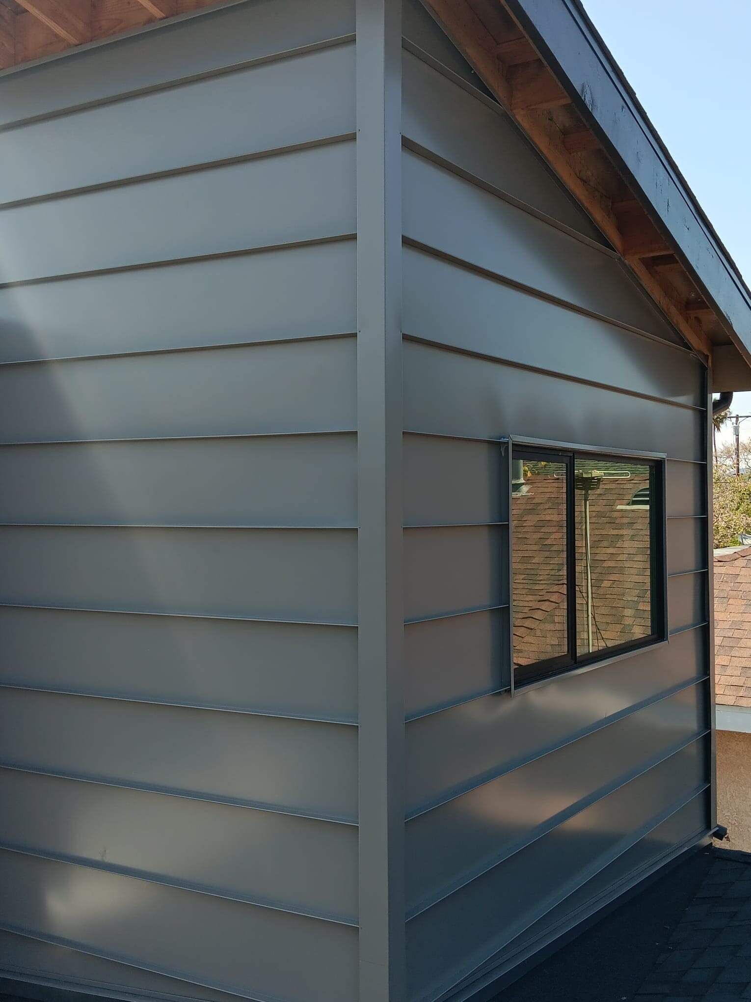 grey metal siding project