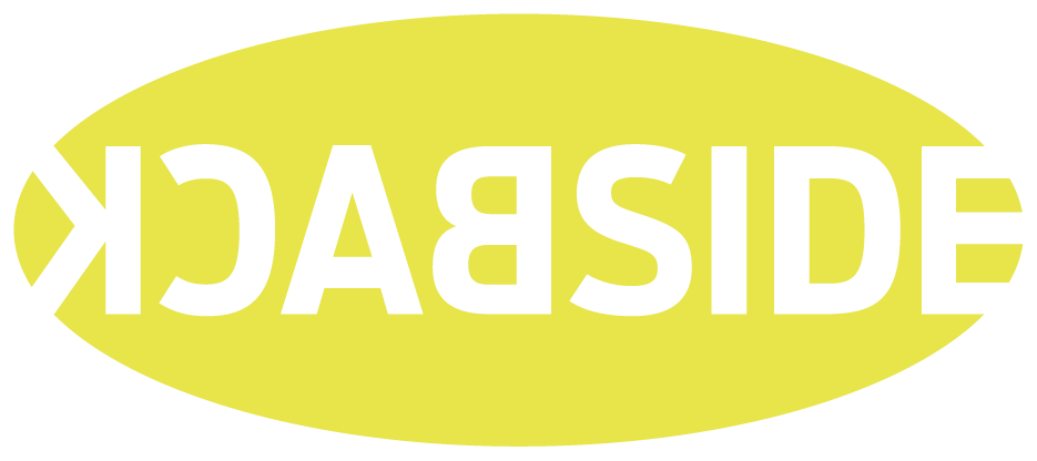 Yellow oval logo with mirrored white text reading BACKSIDE