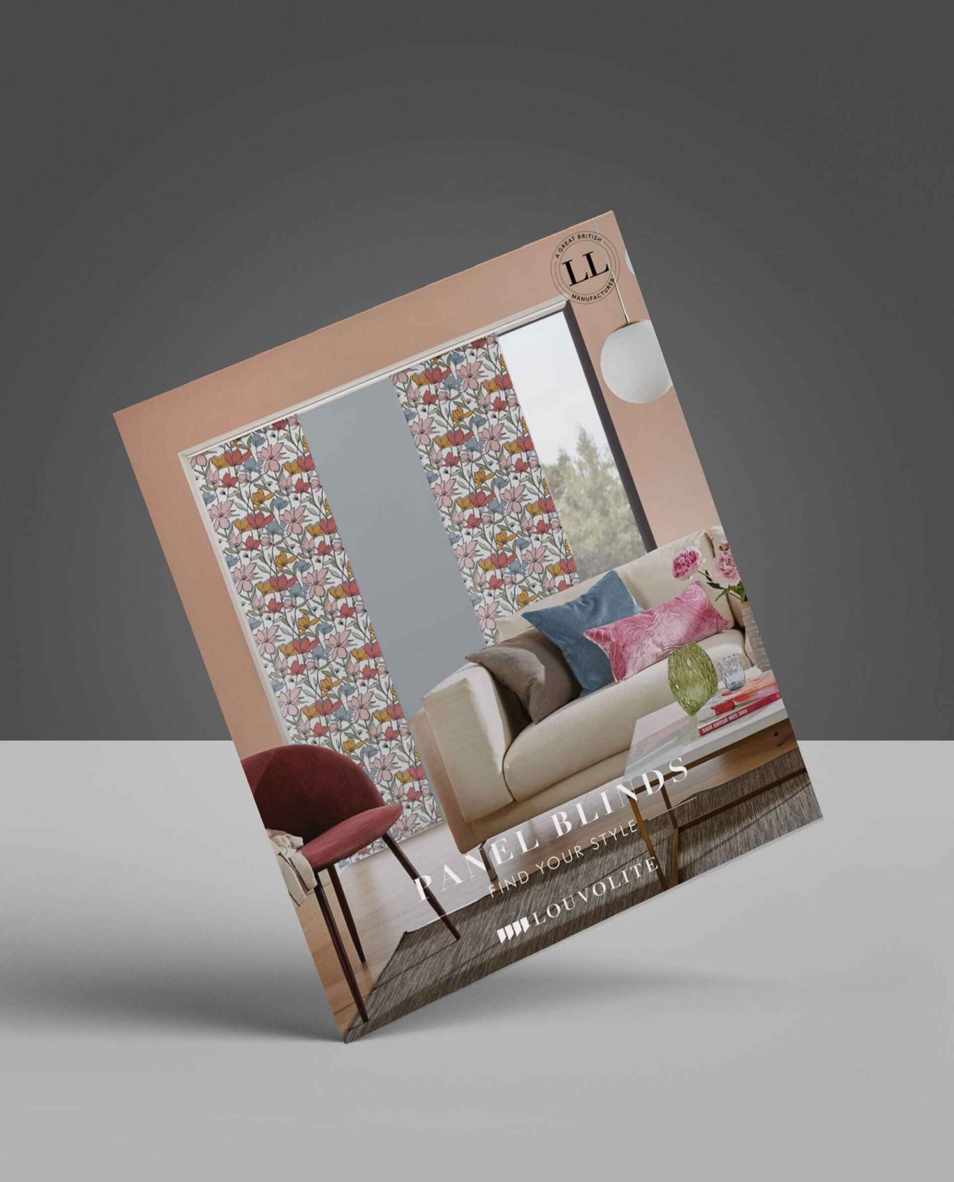 Brochure featuring a living room with patterned window blinds, sofa, and a table.