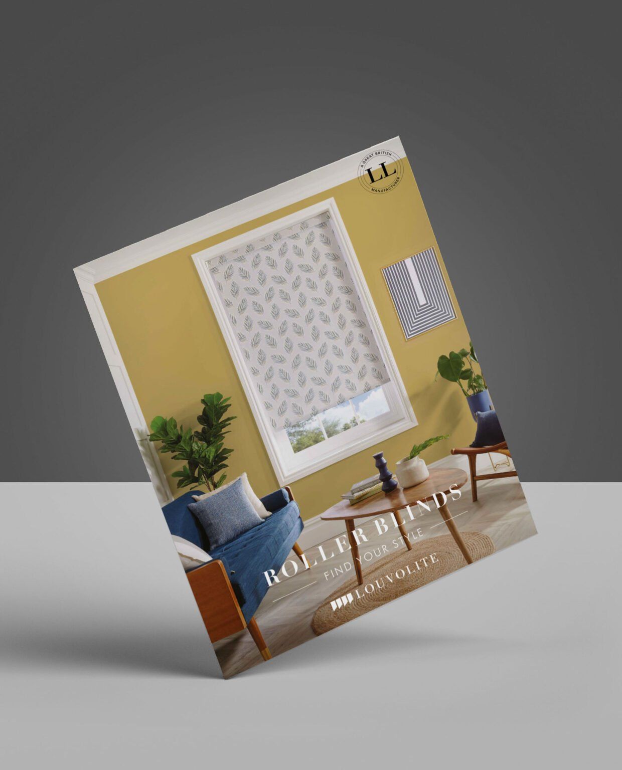 Catalog for roller blinds, featuring a living room with yellow wall and patterned window blind.