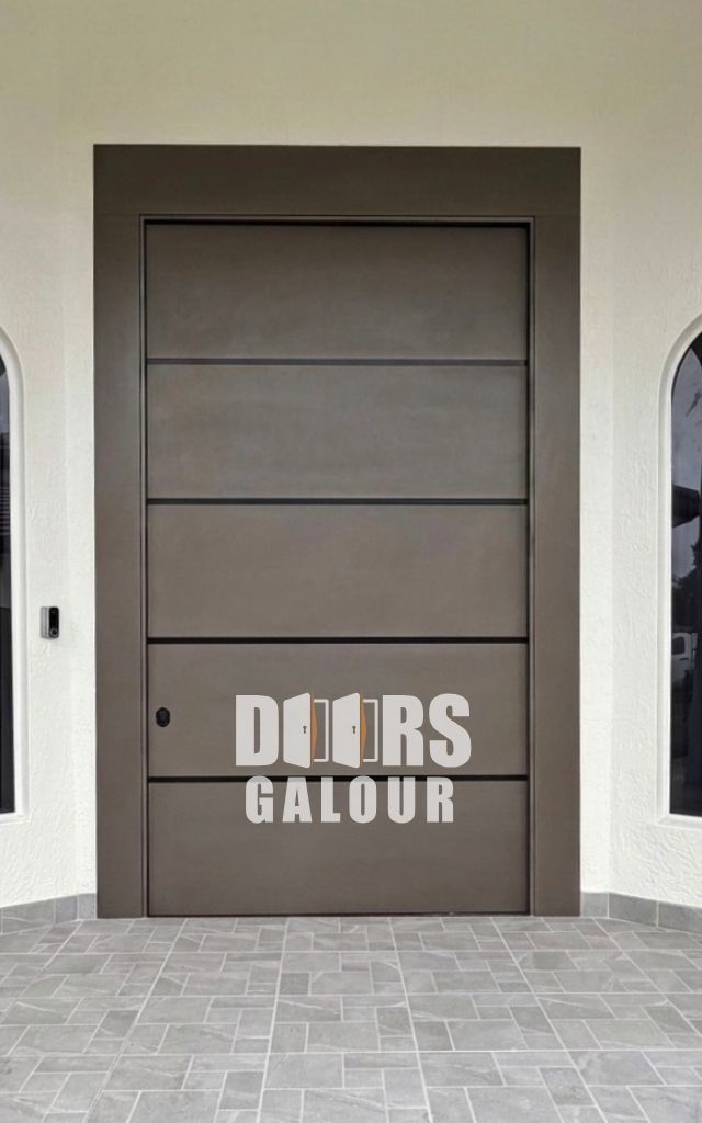 Black modern front door with horizontal silver accent and long vertical handle.