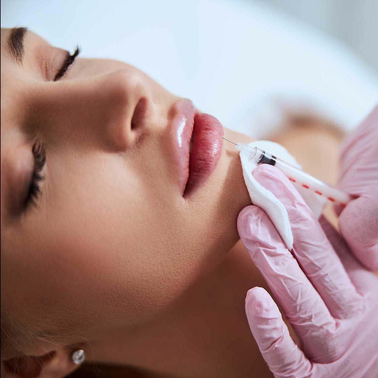 Beautiful young woman undergoing a non-surgical cosmetic procedure
