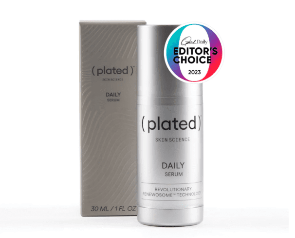 A bottle of plated daily serum next to its box