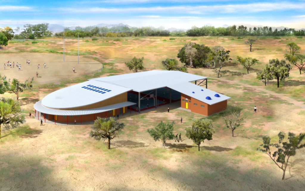 Rendering of a modern, low-slung building with a sports field nearby; set in a dry, grassy landscape.