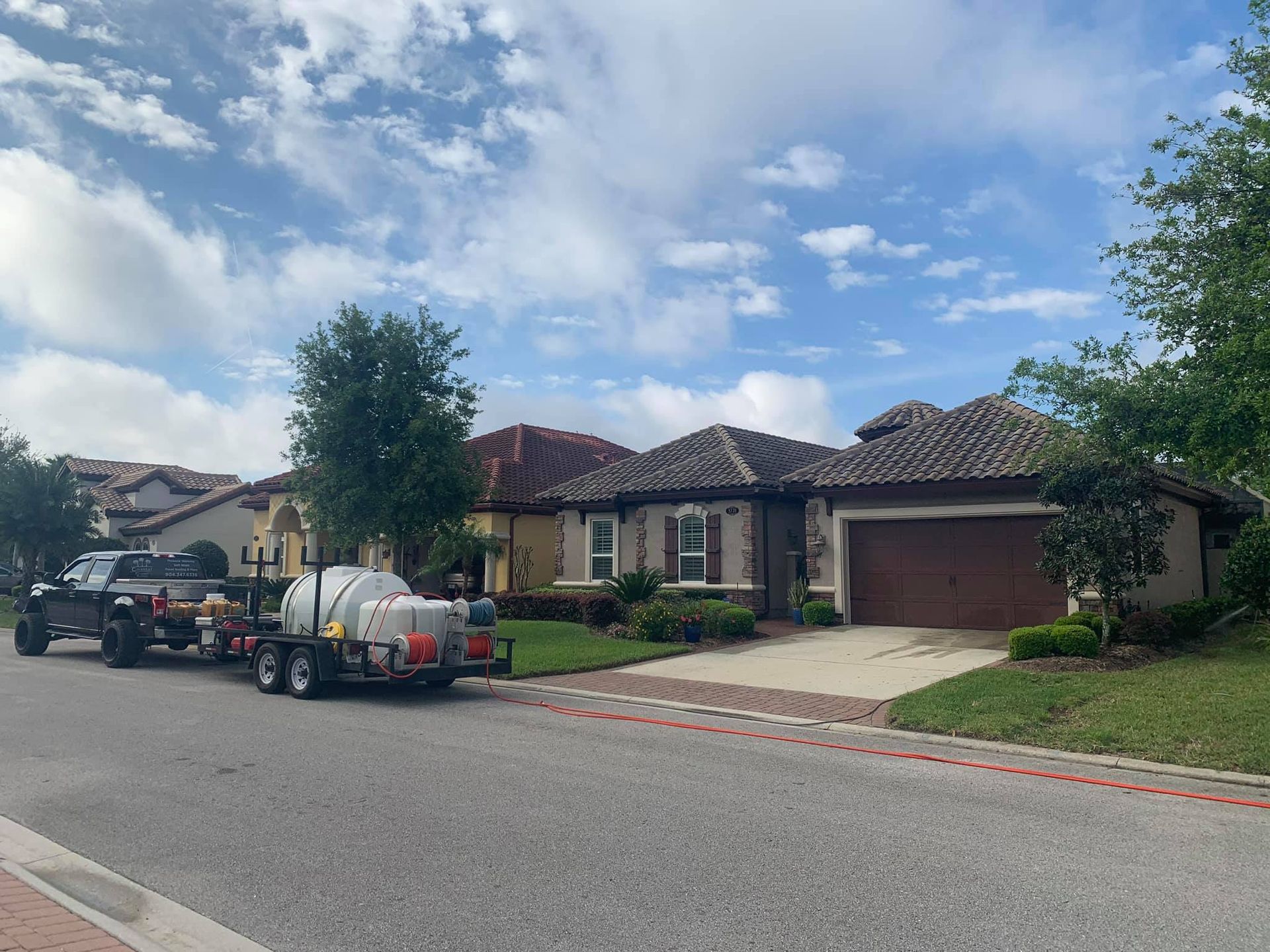 Truck Parked in Front of House | Jacksonville, FL | Coastal Pressure Washing