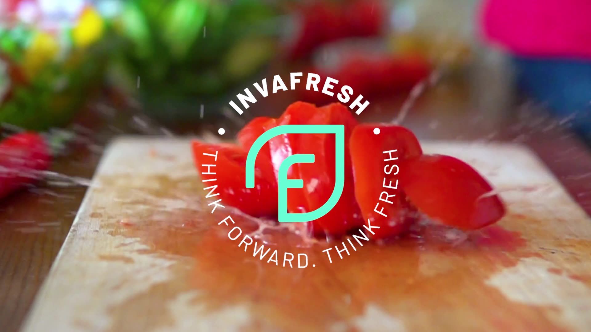 Fresh fruit on a cutting board with a circular logo and the words “THINK FORWARD. THINK FRESH.”