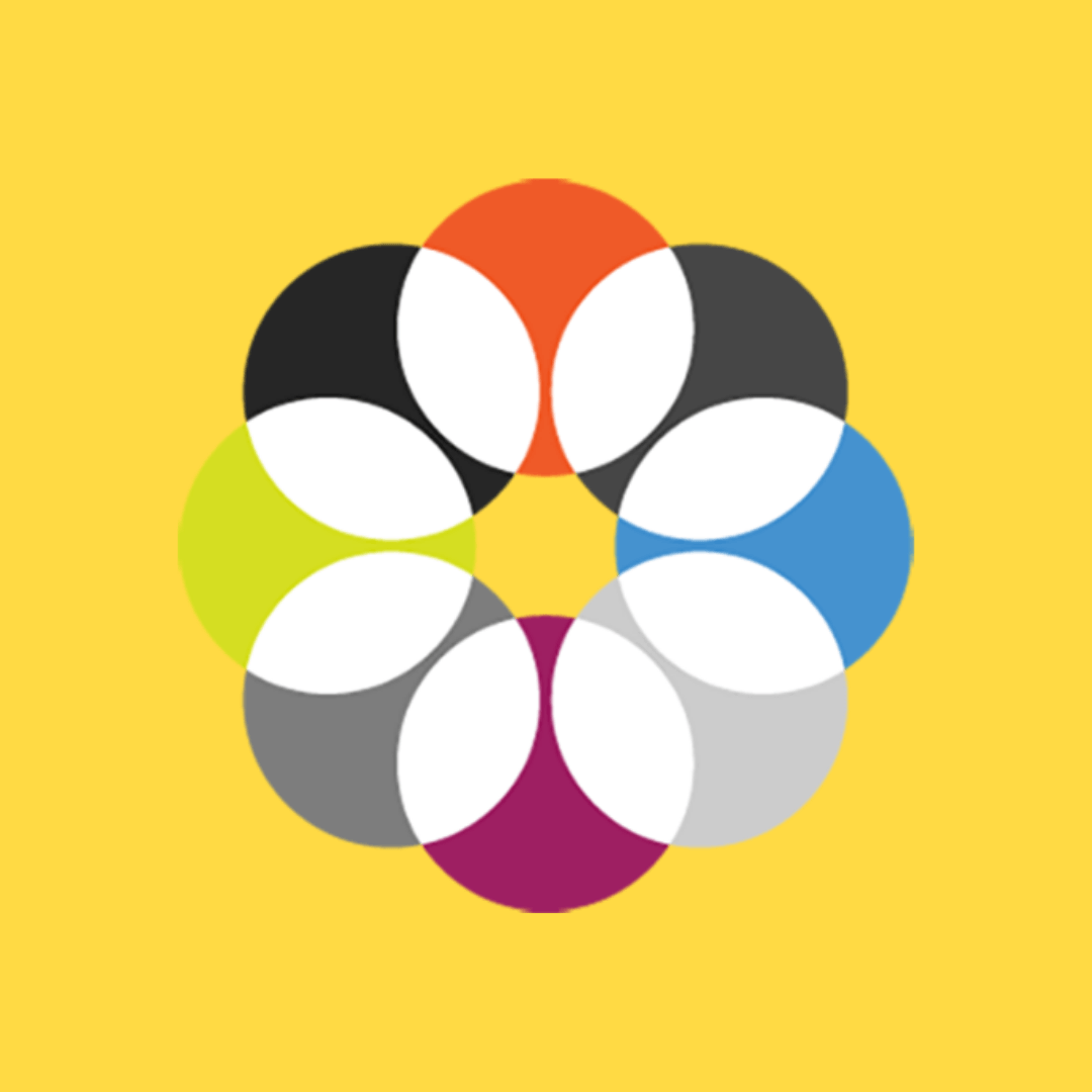 A colorful flower is on a yellow background