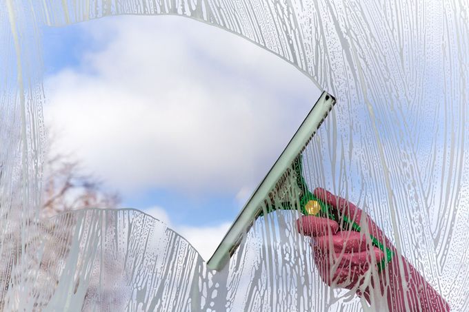 Window being cleaned to show the sky